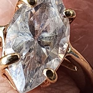 14k rose gold and salt and pepper diampnd engagement ring.